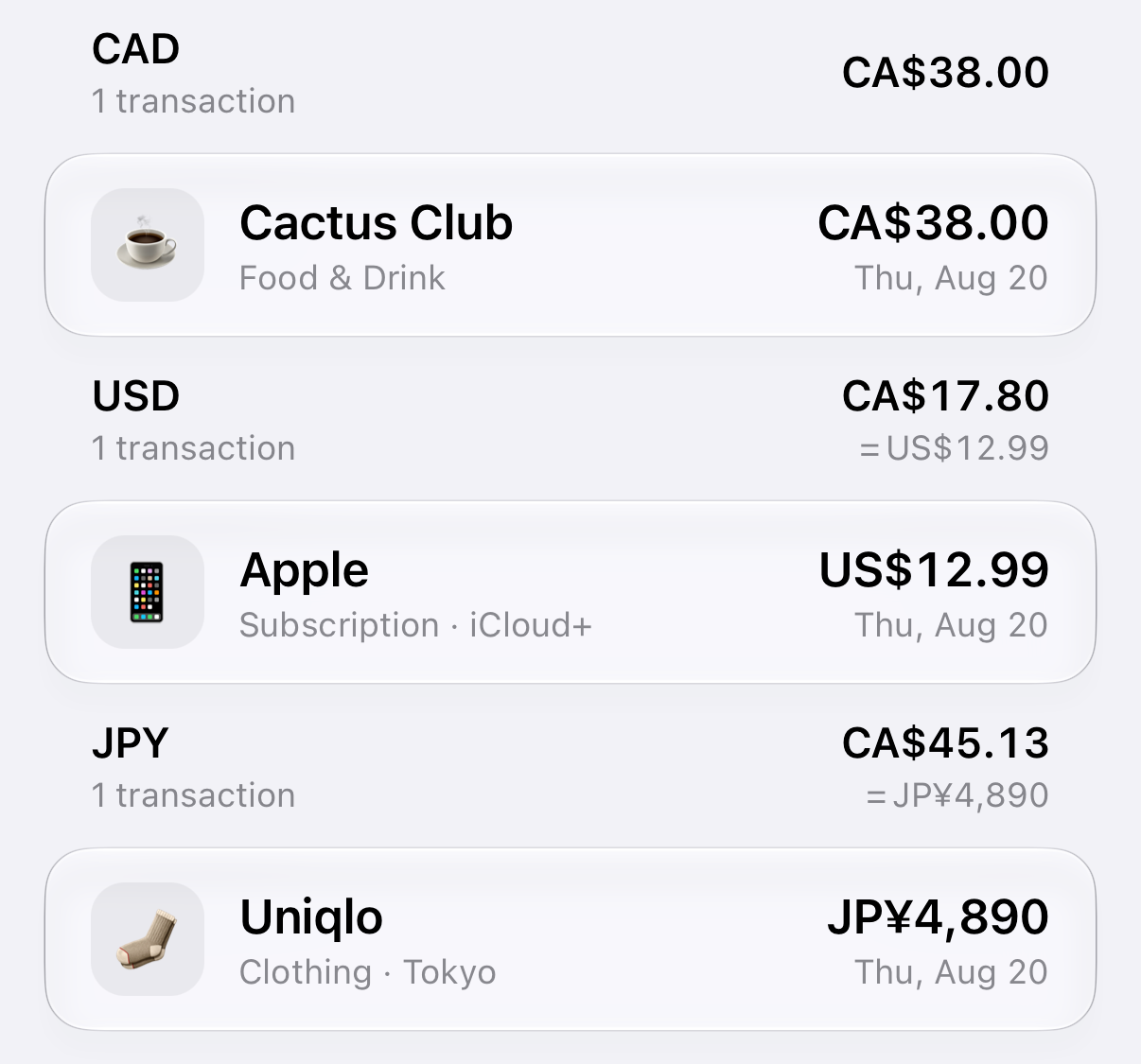 Transactions grouped into CAD, USD, and JPY